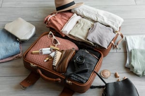 arrangement-clothes-accessories-suitcase